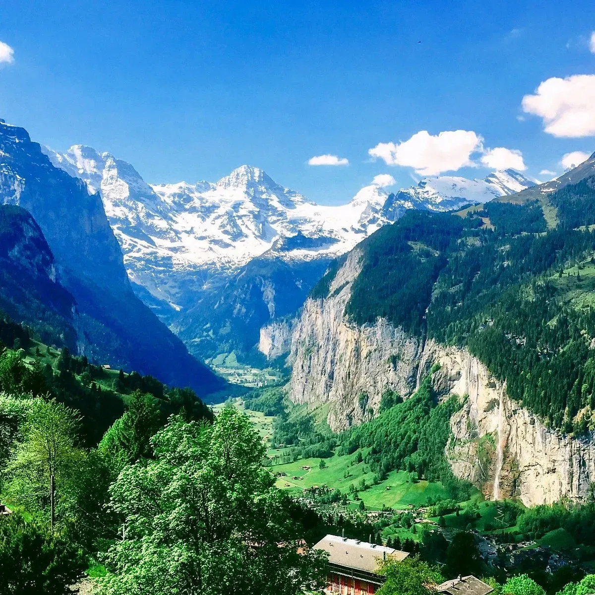 The Lauterbrunnen valley with waterfalls and snowy peaks