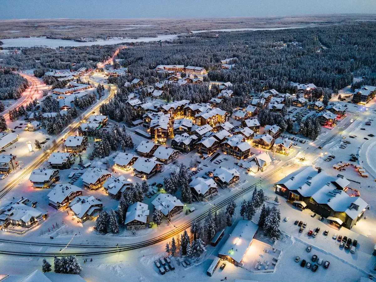 The village of Levi under snow at dusk