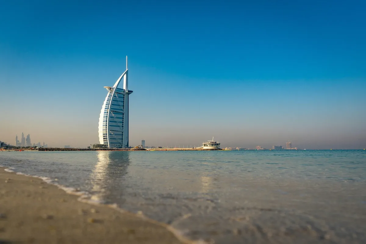 The Burj Al Arab seen across a quiet beach